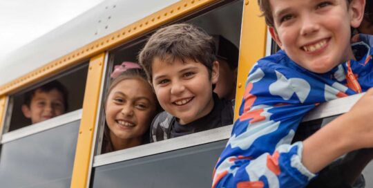 photo of kids of a school bus - Naperville education photography